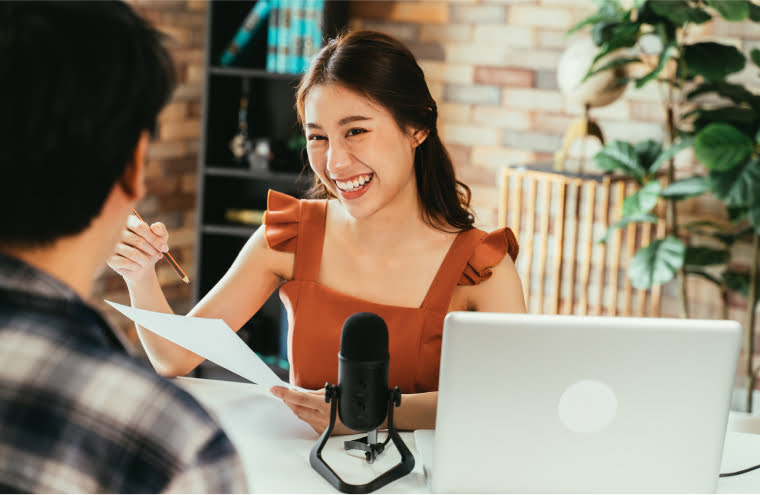 female-podcaster-interviewing-guest-2021-09-04-03-50-49-utc 1